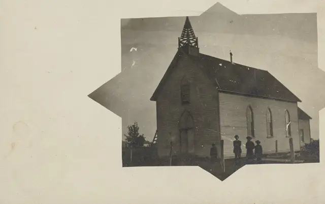 Church with people standing outside
