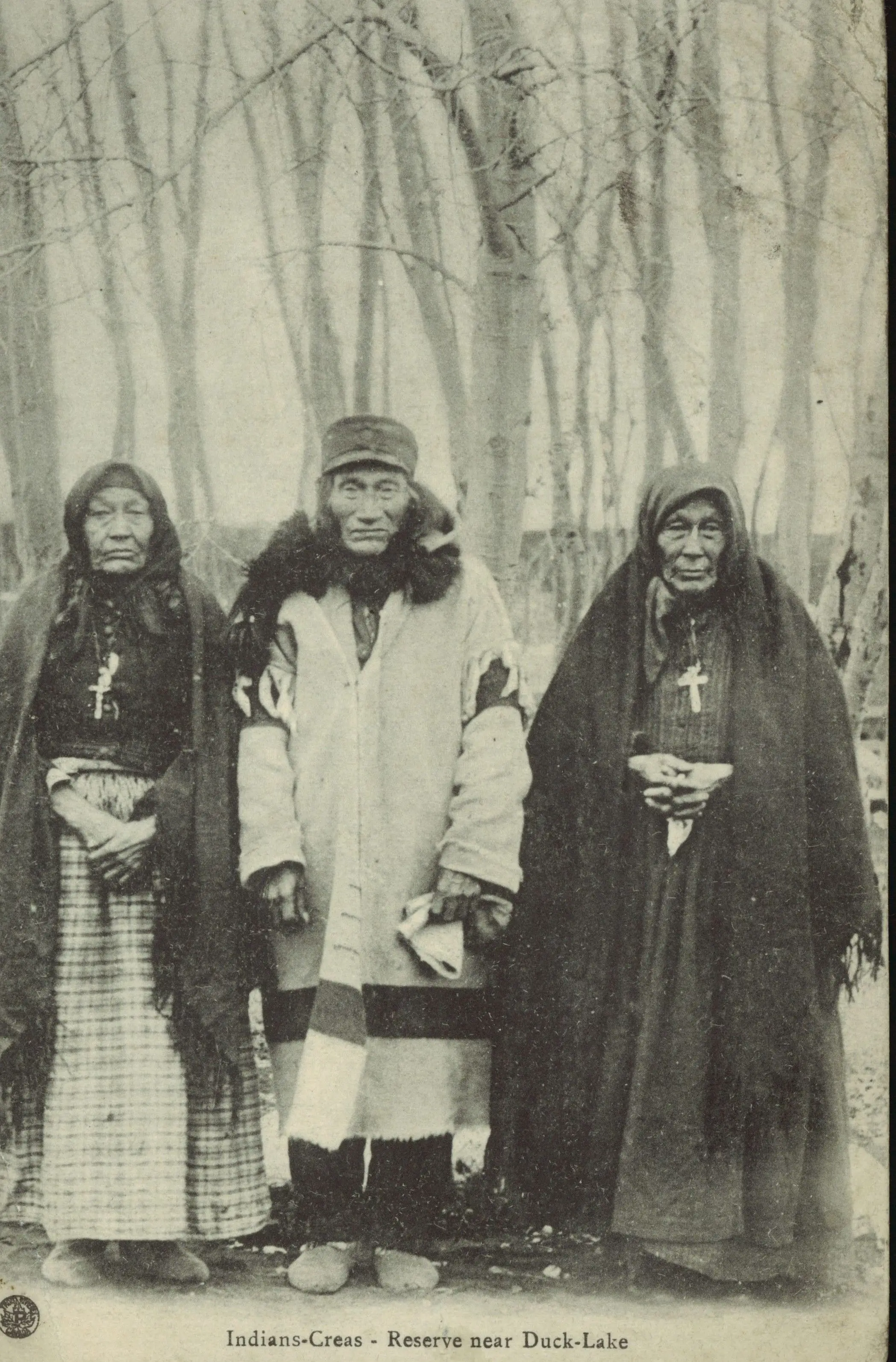 Three elderly Cree people on a reserve near Duck Lake